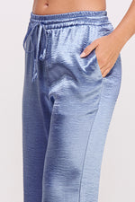 Load image into Gallery viewer, Women&#39;s wholesale Drawstring elasticized waistband Metallic Flared Pants

