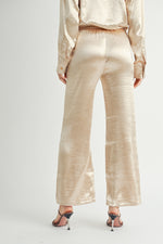 Load image into Gallery viewer, Women Wholesale brand Metallic Pants The elastic waist ensures a customizable and flattering fit, while the wide-leg silhouette adds a touch of modern flair.
