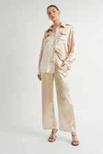 Load image into Gallery viewer, Women Wholesale brand Metallic Pants The elastic waist ensures a customizable and flattering fit, while the wide-leg silhouette adds a touch of modern flair.
